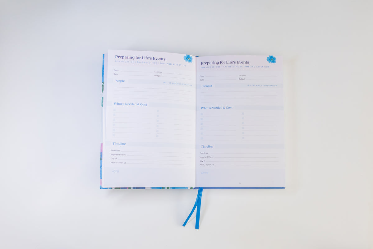 An open planner or journal with two printed pages titled 'Preparing for Life's Events,' shown on a clean white background with blue ribbon bookmarks.