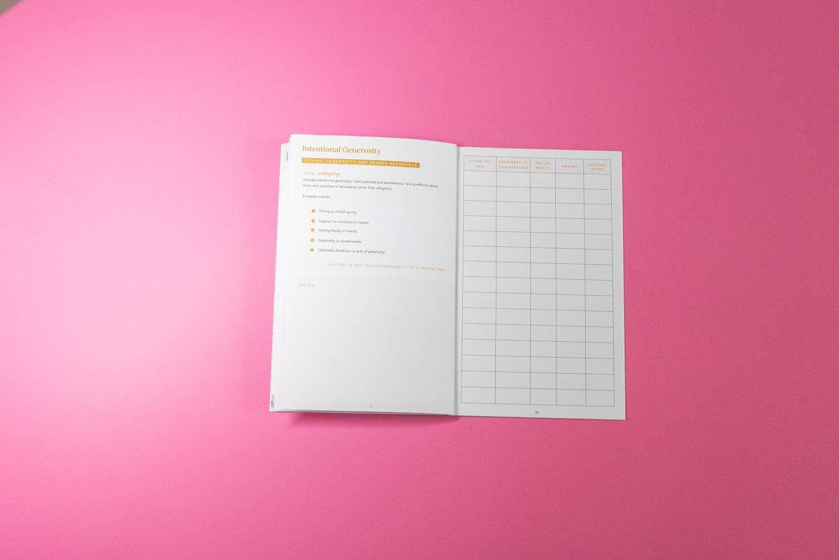 An open white planner or notebook showing a checklist page and a grid table, placed on a solid bright pink background.